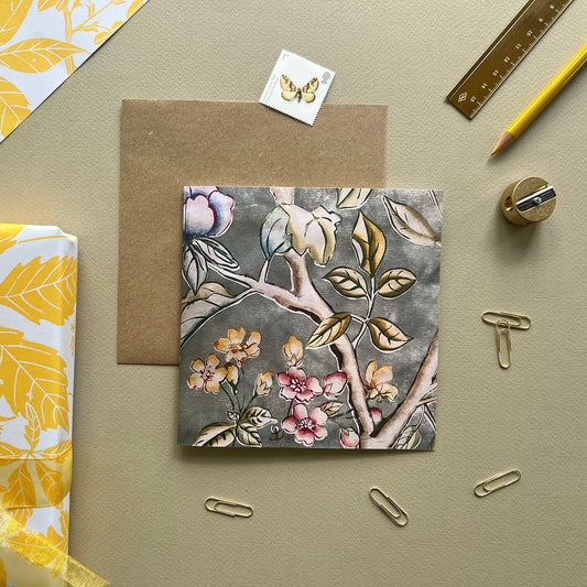 Square greetings card with a detail from Linocut wallpaper design featuring Chinese wallpaper inspired Blossom branches and Peony Flowers