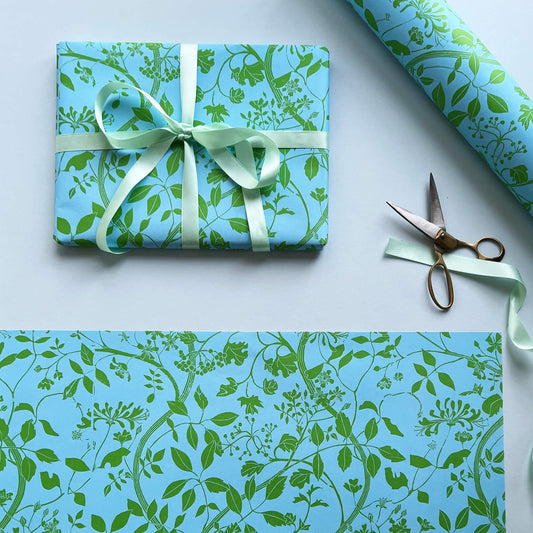 Wrapping paper featuring lino print design inspired by Botanical subjects including guelder rose, woodbine and dog roses